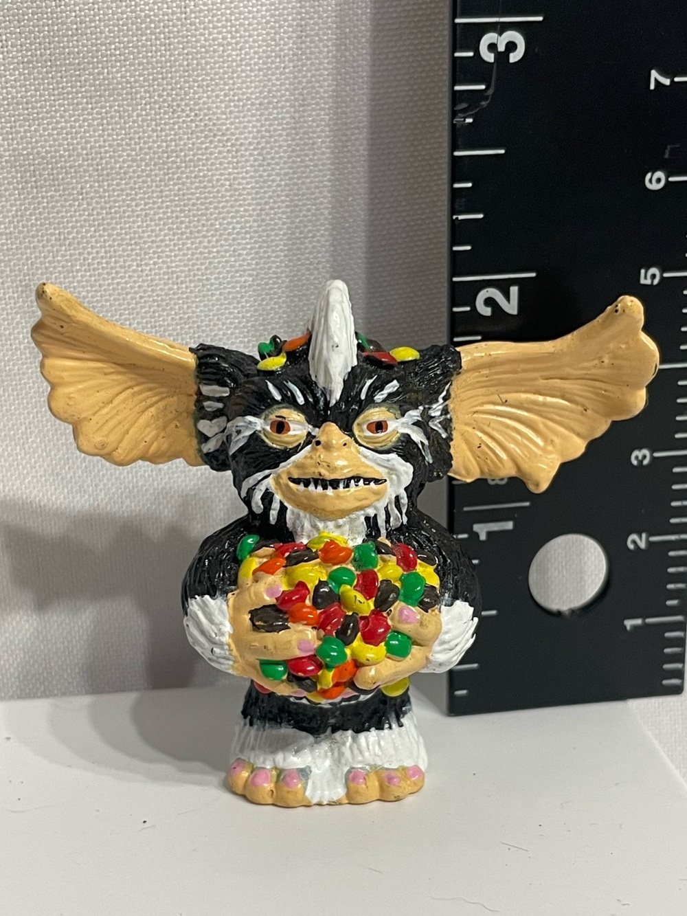 vintage 1990 Applause Gremlins 2 Stripe / Mohawk PVC Figure holding a colorful p